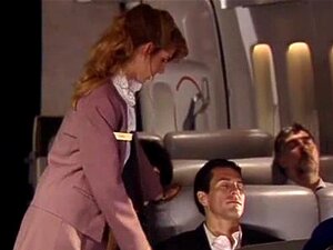 Baise en uniforme dans un avion