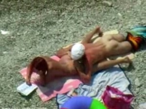 Voyeur torride sur la plage