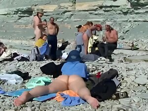 Sexe sur la plage. Film voyeur 37